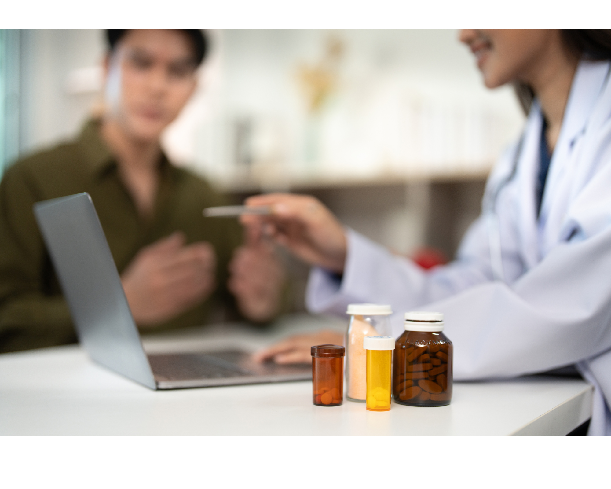 Healthcare professional discussing medication and nutrition plan with patient during clinic consultation