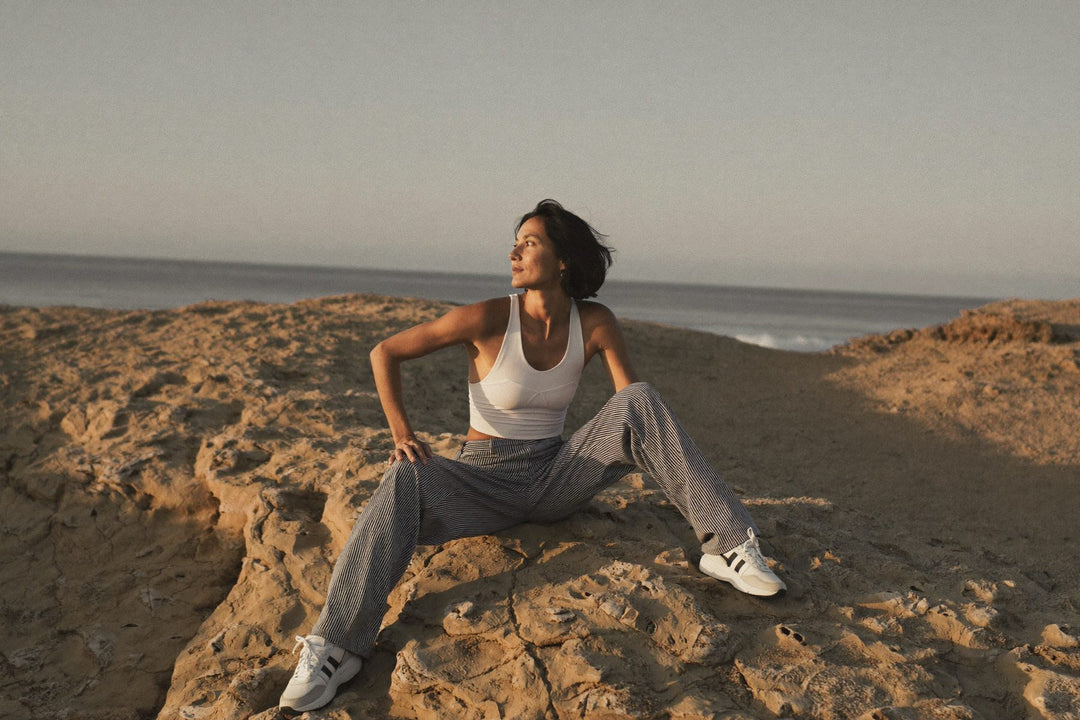 A confident, energetic woman in her fifties who feels strong in her body again